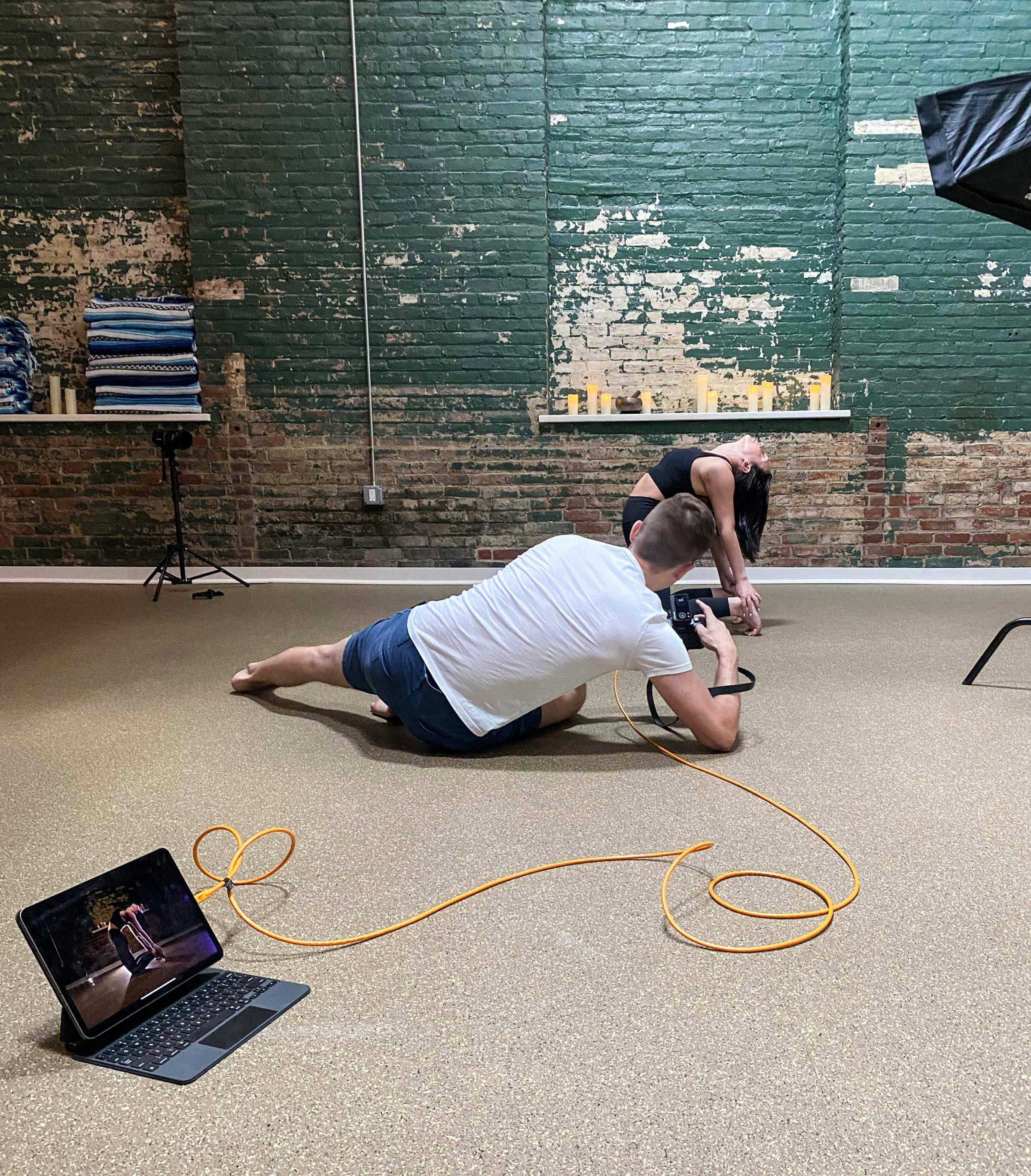 Behind-the-scenes view of yoga portrait session